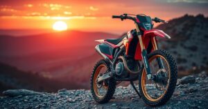 A motocross bike resting on uneven terrain with a scenic sunset backdrop, showcasing an adventurous spirit.