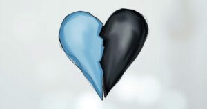 A stylised depiction of a split heart symbolising divorce, with shades of blue and grey illustrating emotional tension.